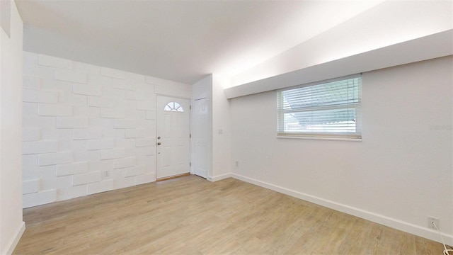 1431 Island Dr S, South Pasadena, FL 33707 - foyer entrance featuring wood finished floors and baseboards