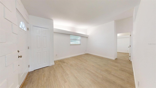 1431 Island Dr S, South Pasadena, FL 33707 - unfurnished room featuring light wood-style floors and healthy amount of natural light