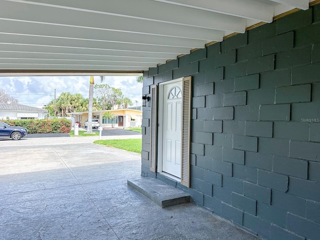 1431 Island Dr S, South Pasadena, FL 33707 - exterior view of concrete block siding