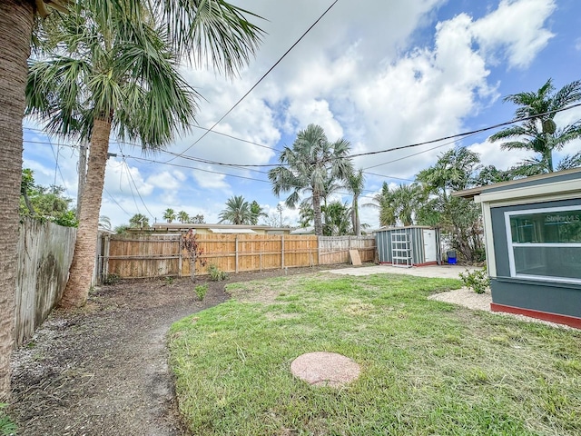 1431 Island Dr S, South Pasadena, FL 33707 - fenced backyard featuring a storage unit