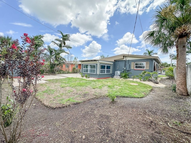 1431 Island Dr S, South Pasadena, FL 33707 - back of property featuring a lawn