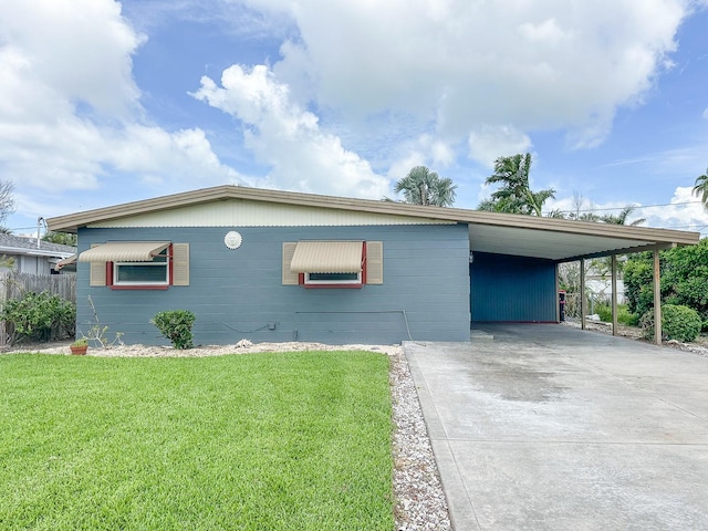 1431 Island Dr S, South Pasadena, FL 33707 - view of front of property with an attached carport and concrete driveway