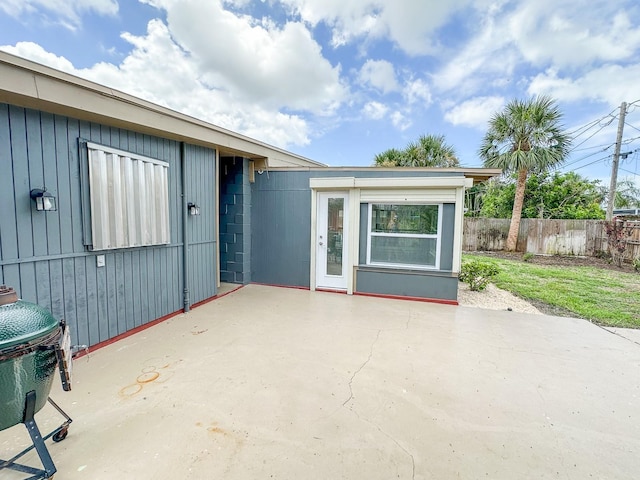 1431 Island Dr S, South Pasadena, FL 33707 - view of exterior entry with a patio area