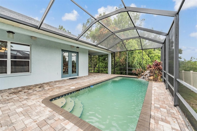117 Camelot Ridge Dr, Brandon, FL 33511 - outdoor pool featuring french doors, a patio area, and glass enclosure
