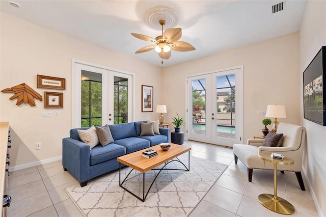 117 Camelot Ridge Dr, Brandon, FL 33511 - living room featuring french doors, light tile patterned floors, and a ceiling fan