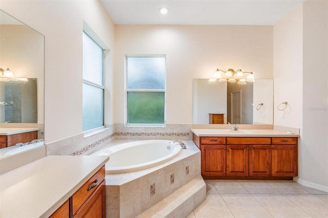 117 Camelot Ridge Dr, Brandon, FL 33511 - full bathroom with vanity, a garden tub, and tile patterned flooring