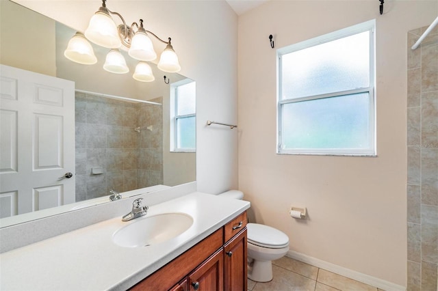 117 Camelot Ridge Dr, Brandon, FL 33511 - bathroom with vanity, tiled shower, tile patterned floors, and a chandelier