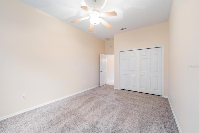117 Camelot Ridge Dr, Brandon, FL 33511 - unfurnished bedroom with light colored carpet, a closet, and a ceiling fan