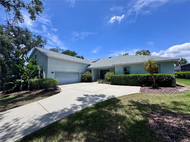 117 Camelot Ridge Dr, Brandon, FL 33511 - single story home featuring stucco siding, an attached garage, and driveway