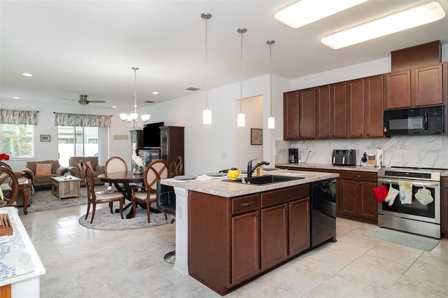 11444 Alachua Creek Ln, Riverview, FL 33579 - kitchen with black appliances, decorative backsplash, light countertops, open floor plan, and pendant lighting