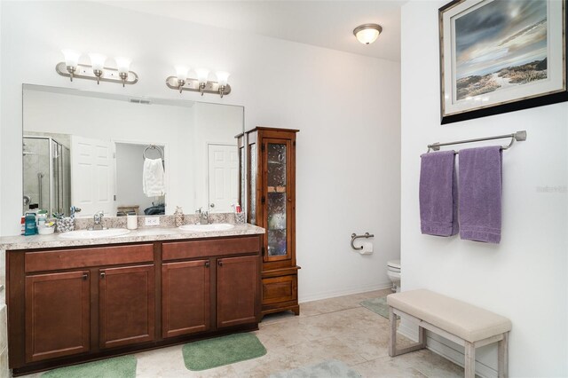 11444 Alachua Creek Ln, Riverview, FL 33579 - bathroom with a stall shower, double vanity, and tile patterned floors