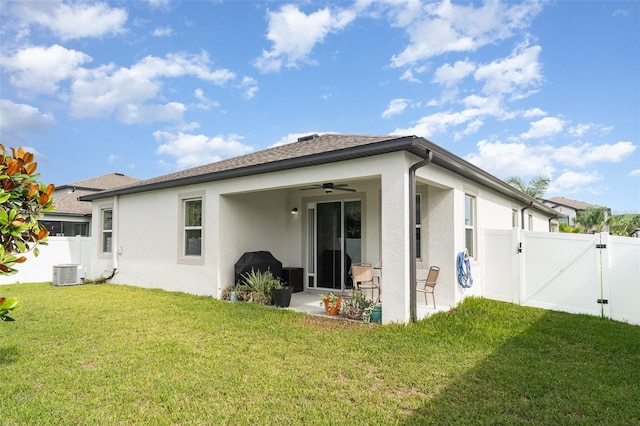 11444 Alachua Creek Ln, Riverview, FL 33579 - rear view of house featuring ceiling fan, a gate, stucco siding, and a patio area