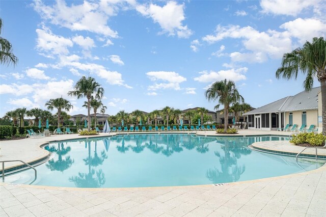 11444 Alachua Creek Ln, Riverview, FL 33579 - community pool featuring a patio area