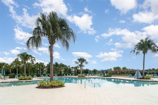 11444 Alachua Creek Ln, Riverview, FL 33579 - community pool featuring a patio area