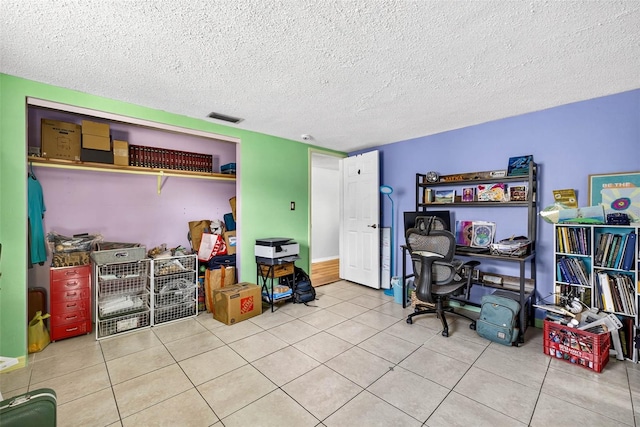 7814 Burnham Dr, Port Richey, FL 34668 - tiled office featuring a textured ceiling
