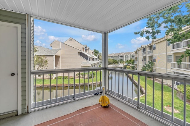 6916 Stones Throw Cir N Unit 9207, Saint Petersburg, FL 33710 - balcony featuring a water view and a residential view