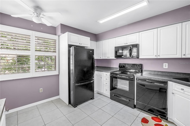 6916 Stones Throw Cir N Unit 9207, Saint Petersburg, FL 33710 - kitchen featuring black appliances, dark countertops, white cabinets, and a ceiling fan