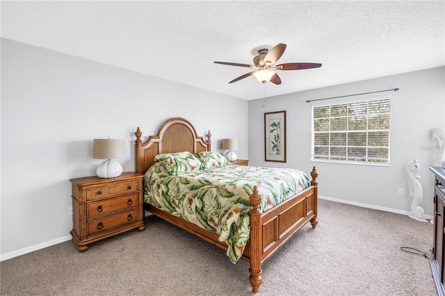 6916 Stones Throw Cir N Unit 9207, Saint Petersburg, FL 33710 - carpeted bedroom featuring a textured ceiling and a ceiling fan