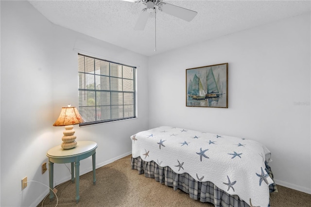6916 Stones Throw Cir N Unit 9207, Saint Petersburg, FL 33710 - carpeted bedroom with a textured ceiling and ceiling fan