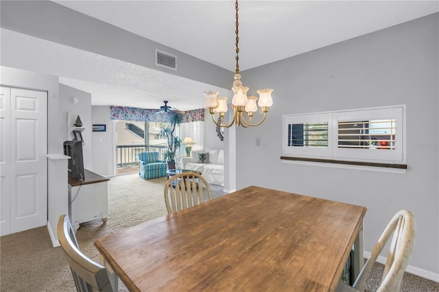 6916 Stones Throw Cir N Unit 9207, Saint Petersburg, FL 33710 - carpeted dining space featuring a chandelier and baseboards