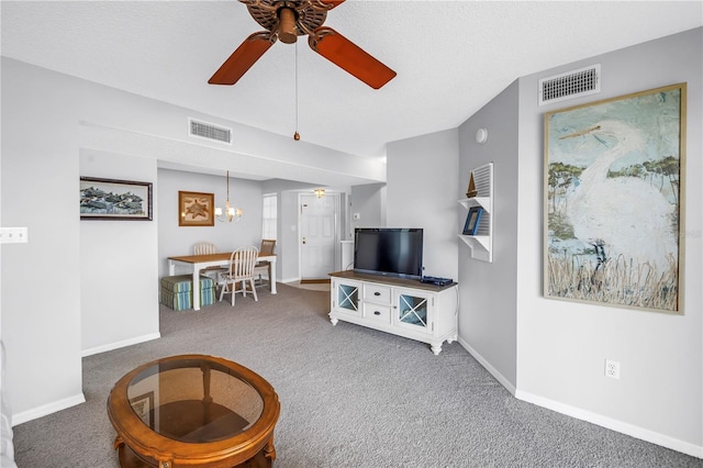 6916 Stones Throw Cir N Unit 9207, Saint Petersburg, FL 33710 - living area featuring carpet floors, ceiling fan, and a chandelier