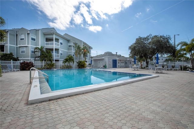 6916 Stones Throw Cir N Unit 9207, Saint Petersburg, FL 33710 - community pool featuring a patio