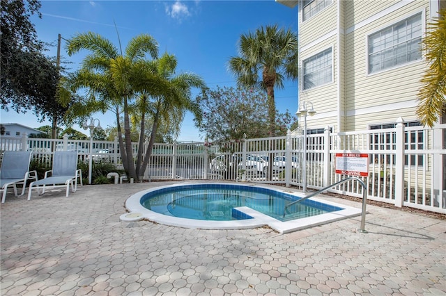 6916 Stones Throw Cir N Unit 9207, Saint Petersburg, FL 33710 - view of swimming pool with a swimming pool and a patio
