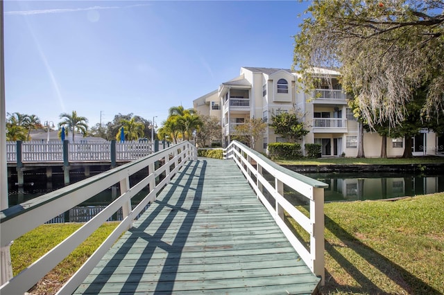6916 Stones Throw Cir N Unit 9207, Saint Petersburg, FL 33710 - dock with a yard and a water view