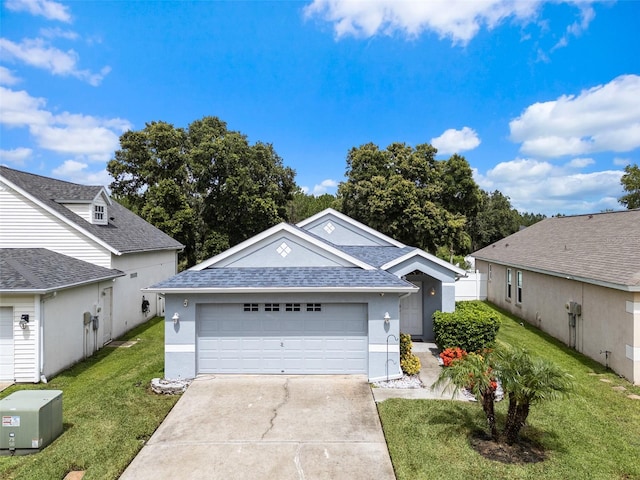 5112 Prairie View Way, Wesley Chapel, FL 33545 - ranch-style home with stucco siding, a front lawn, concrete driveway, a shingled roof, and an attached garage