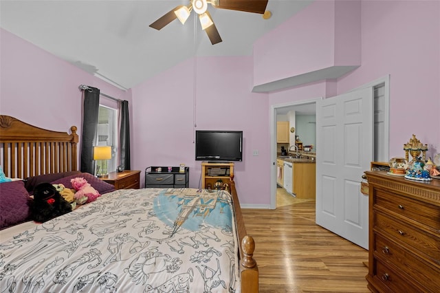 5112 Prairie View Way, Wesley Chapel, FL 33545 - bedroom featuring light wood finished floors, high vaulted ceiling, and ceiling fan