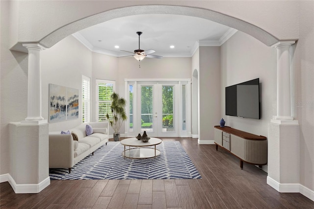27455 Mistflower Dr, Wesley Chapel, FL 33544 - living area with ceiling fan, decorative columns, arched walkways, wood finished floors, and recessed lighting
