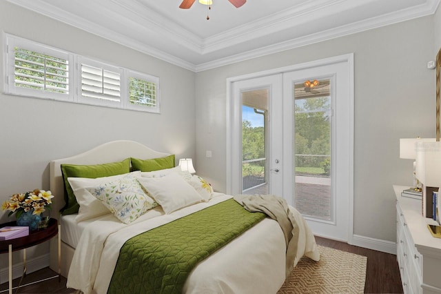 27455 Mistflower Dr, Wesley Chapel, FL 33544 - bedroom featuring french doors, access to exterior, dark wood finished floors, ornamental molding, and ceiling fan