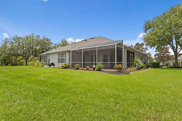 27455 Mistflower Dr, Wesley Chapel, FL 33544 - rear view of property featuring a yard and a lanai
