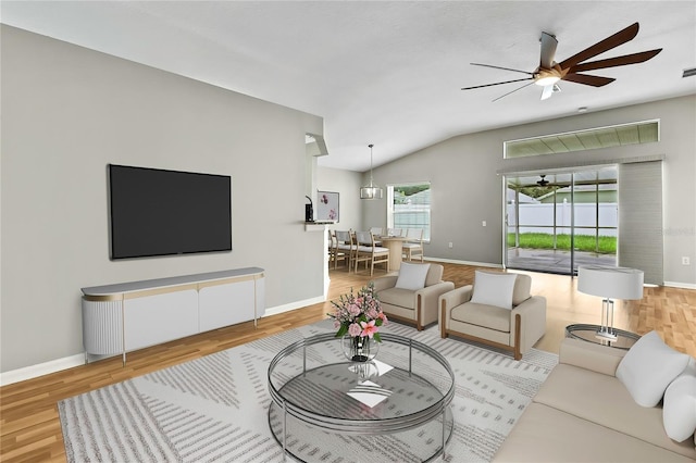 19635 Bellehurst Loop, Land O Lakes, FL 34638 - living room with ceiling fan, lofted ceiling, and wood finished floors