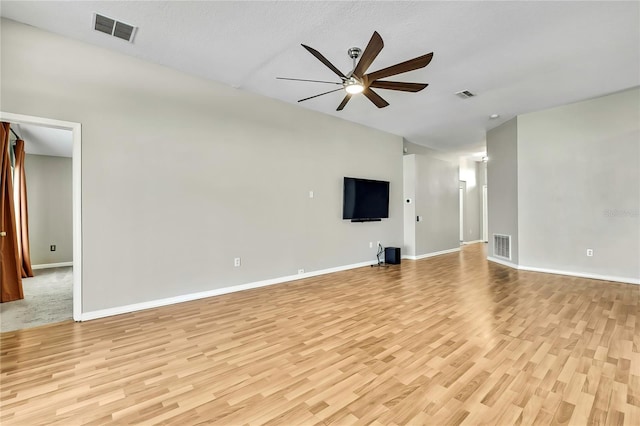 19635 Bellehurst Loop, Land O Lakes, FL 34638 - unfurnished room with a ceiling fan, light wood-style floors, and vaulted ceiling