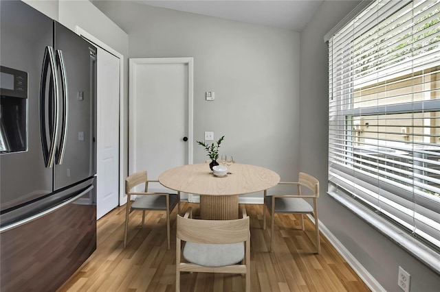 19635 Bellehurst Loop, Land O Lakes, FL 34638 - dining space with light wood-type flooring and baseboards
