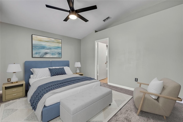 19635 Bellehurst Loop, Land O Lakes, FL 34638 - bedroom featuring lofted ceiling, light carpet, a ceiling fan, and ensuite bath