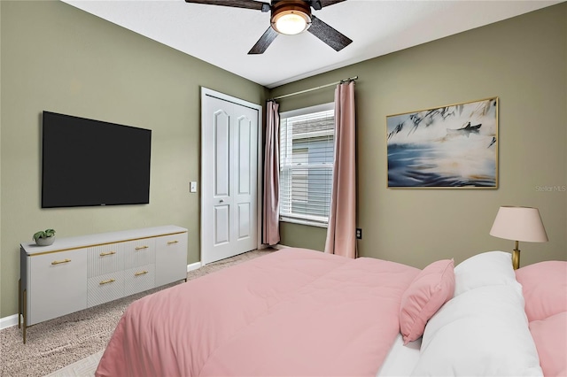 19635 Bellehurst Loop, Land O Lakes, FL 34638 - bedroom with light carpet, ceiling fan, and a closet