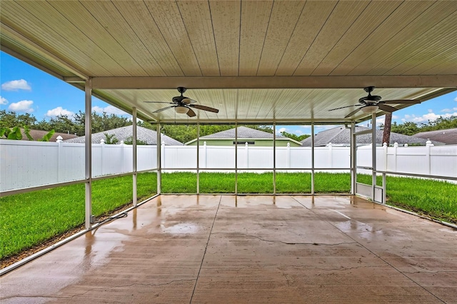 19635 Bellehurst Loop, Land O Lakes, FL 34638 - fenced backyard featuring a ceiling fan and a patio area