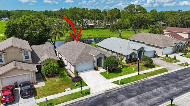 11348 Tee Time Cir, New Port Richey, FL 34654 - aerial view of residential area with a nearby body of water