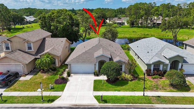 11348 Tee Time Cir, New Port Richey, FL 34654 - aerial perspective of suburban area featuring a large body of water