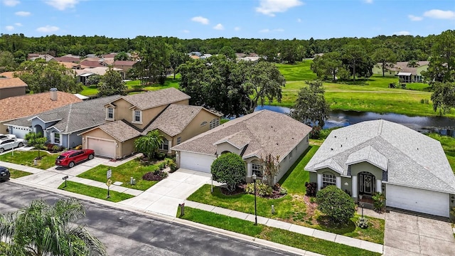 11348 Tee Time Cir, New Port Richey, FL 34654 - aerial view of residential area featuring a nearby body of water