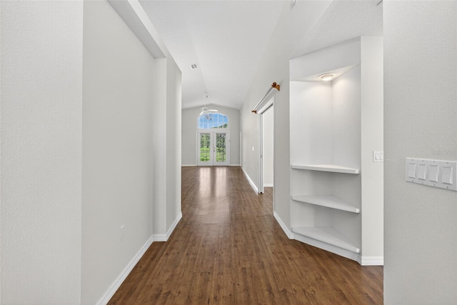 11348 Tee Time Cir, New Port Richey, FL 34654 - hallway featuring lofted ceiling and dark wood-type flooring