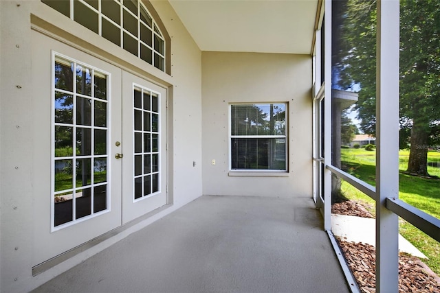 11348 Tee Time Cir, New Port Richey, FL 34654 - unfurnished sunroom with french doors