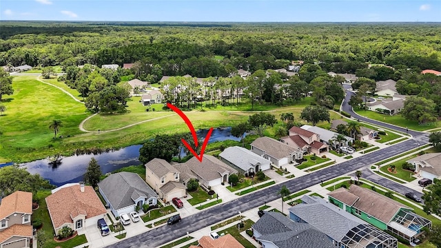 11348 Tee Time Cir, New Port Richey, FL 34654 - aerial view of property and surrounding area featuring a large body of water and nearby suburban area