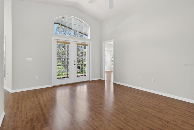 11348 Tee Time Cir, New Port Richey, FL 34654 - entryway with ceiling fan, dark wood-style flooring, french doors, and high vaulted ceiling