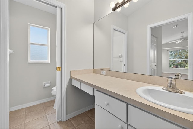 11348 Tee Time Cir, New Port Richey, FL 34654 - bathroom featuring vanity, a ceiling fan, and tile patterned flooring