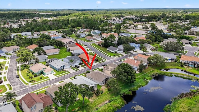 11348 Tee Time Cir, New Port Richey, FL 34654 - aerial view of property's location with nearby suburban area and a nearby body of water