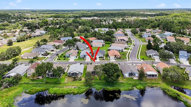 11348 Tee Time Cir, New Port Richey, FL 34654 - aerial overview of property's location with nearby suburban area and a nearby body of water