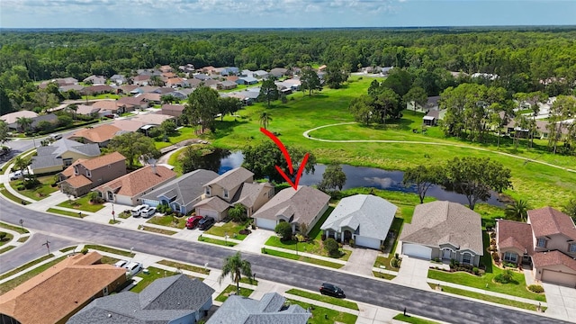 11348 Tee Time Cir, New Port Richey, FL 34654 - aerial perspective of suburban area with a nearby body of water
